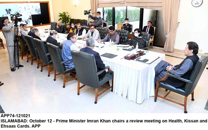 APP74-121021PM-Islamabad
