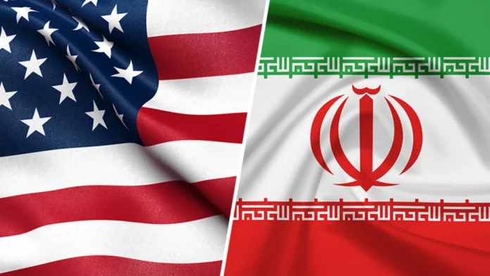 180606093823-us-iran-flags-696x392